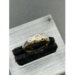 An 18ct yellow gold three diamond on a platinum mount ring (Approximate Total Weight 2.2g)