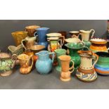 A large selection of pottery jugs various makers to include Kensington Ware, Myott etc.