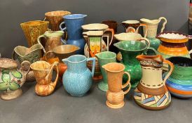 A large selection of pottery jugs various makers to include Kensington Ware, Myott etc.