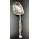 A Sterling silver serving spoon with shell handle by WHITING MANUFACTURING COMPANY