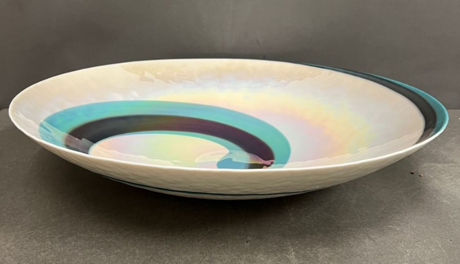 A large decorative bowl with swirl design
