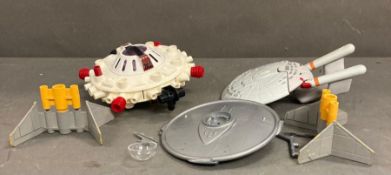 A selection of play worm toys to include the USS Enterprise