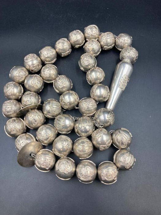 A large set of Arabian silver worry beads approximately 1400g