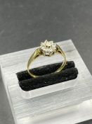 An 18ct gold diamond ring, approximate total weight 2.2g Size N1/2