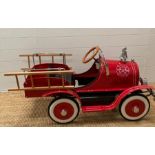 An F.A.O Schwartz or New York child's pedal fire engine