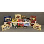 A selection of boxed and unboxed toy cars, Lledo etc