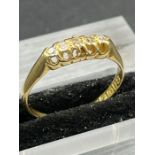 A five stone 18ct yellow gold ring, approximate total weight 2.5g Size N