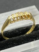 A five stone 18ct yellow gold ring, approximate total weight 2.5g Size N