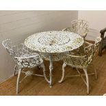 A white painted metal garden table and three chairs