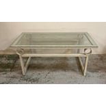 A white metal glass topped coffee table (H46cm W110cm D61cm)