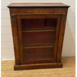 A mahogany string inlaid glazed cabinet with gilt metal mounts (H94cm W73cm D30cm)