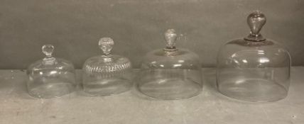 A selection of five vintage glass cloche