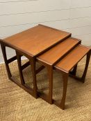 A set of three G-Plan "Quadrille" nesting tables in teak