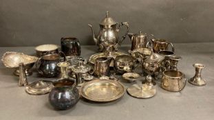 A quantity of silver plate items to include coffe pot, milk jugs and candle sticks