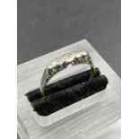 An 18ct gold antique five stone diamond ring (Approximate Total weight 1.8g) AF