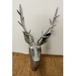A wall hanging metal Stag's head
