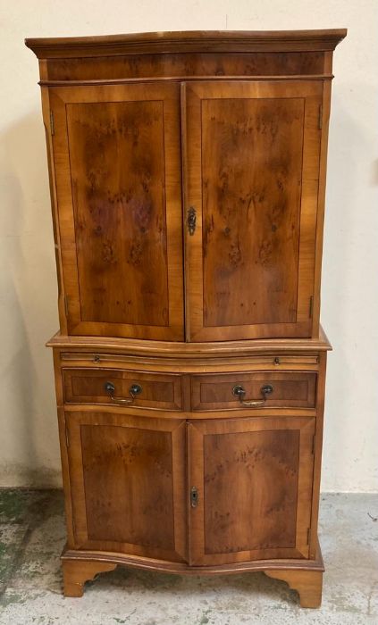 A yew bow fronted single drawer two cupboard drink cabinet (H150cm W70cm D40cm)