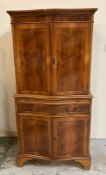 A yew bow fronted single drawer two cupboard drink cabinet (H150cm W70cm D40cm)