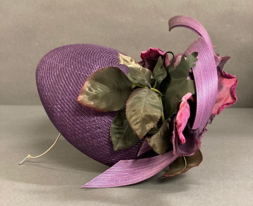 A purple fascinator with purple sculpted twist intertwined with faux rose detail - Image 6 of 6
