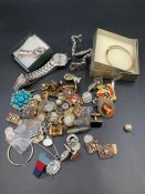 A small selection of costume jewellery along with, badges, watches and keyring.