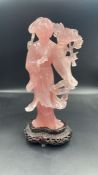 A Rose quartz Chinese figure on stand (Approximate total height without stand is 25cm)