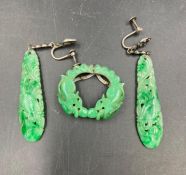 A Jade brooch and earring set.