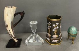 Four decorative items including a vase and a horn cup