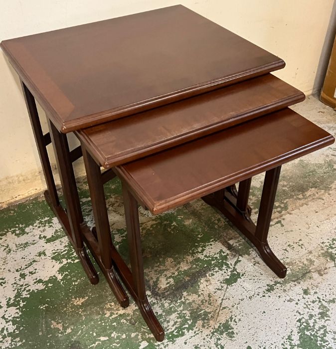 A trio of nesting tables