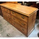 A large pine kitchen unit comprising of six large drawers (H94cm W184cm D57cm)