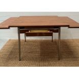 A Mid Century Formica 60's table with extensions to sides by Super Mac Le Tubrnenage H77cm W137cm