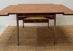 A Mid Century Formica 60's table with extensions to sides by Super Mac Le Tubrnenage H77cm W137cm
