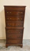 A mahogany six drawer chest on chest with drop handles