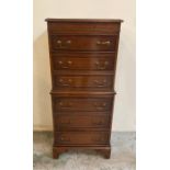 A mahogany six drawer chest on chest with drop handles