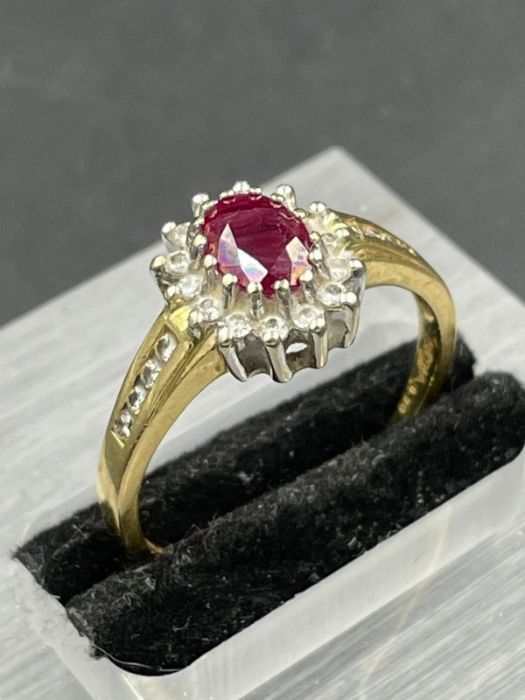 An 18ct gold ruby and diamond ring 0.33ct in total (Approximate Total Weight 4.2g) Size T1/2