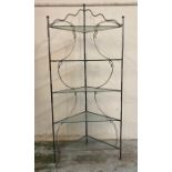 A wrought iron corner unit consisting of five glass shelves (H170cm)