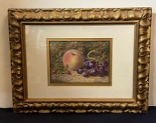 A still life, watercolour, Peach and Grapes in ornate frame, indistinct signature bottom left.(