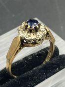 A 9ct gold diamond and sapphire ring (Approximate Total weight 2.8g)