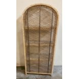 A Mid Century rattan white painted arched shelving unit (H131cm)