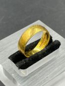 A 22ct gold wedding band (Approximate Total Weight 4.8g)