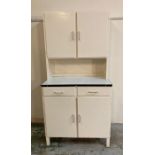 A white painted Mid Century kitchen unit with metal work top, two drawers and two cupboards over and