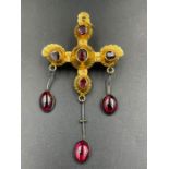 A French gold cross brooch with amber pendant