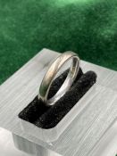 An 18ct gold, marked 750, white gold wedding band (Approximate Total Weight 3.3g) Size J