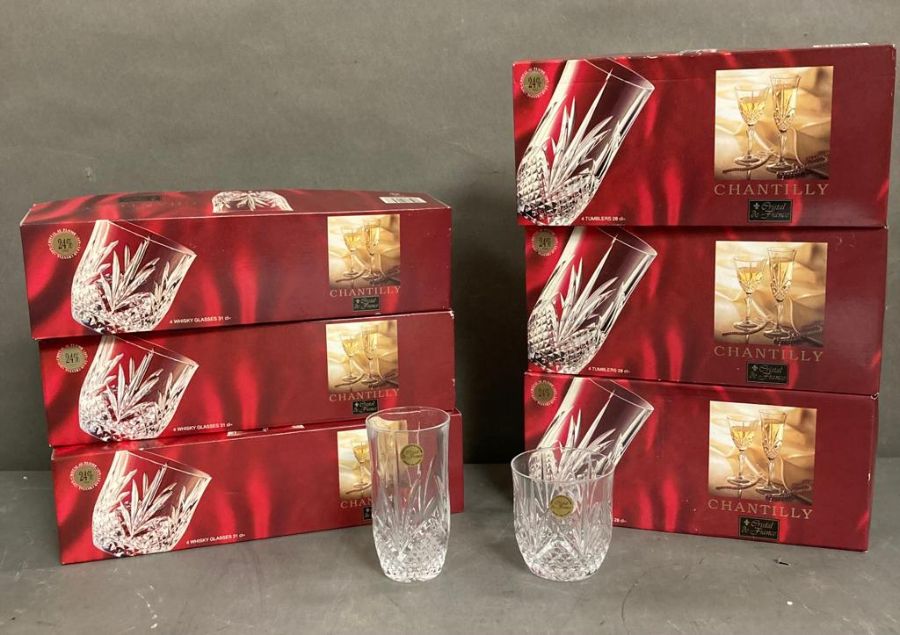 A selection of French crystal glasses to include twelve whisky glasses and twelve tumblers boxed