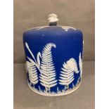 A Wedgewood blue Jasperware stilton bell with oak leaf relief AF