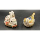 Two boxed Royal Crown Derby paperweights, Firecrest and Meadow Rabbit, one with gold stopper and one