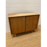 A two door Mid Century teak side cabinet by Musterring