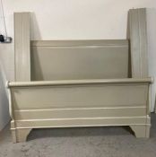 A grey painted sleigh bed with scrolling bed head and stead 5ft x 6ft