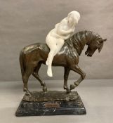 A bronze sculpture of The Pacing Horse with a marble lady astride titled Isabeau and signed by the