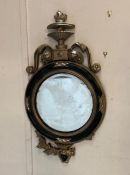 A French style circular hall mirror with leaf scrolls and lions head details AF