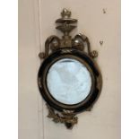 A French style circular hall mirror with leaf scrolls and lions head details AF